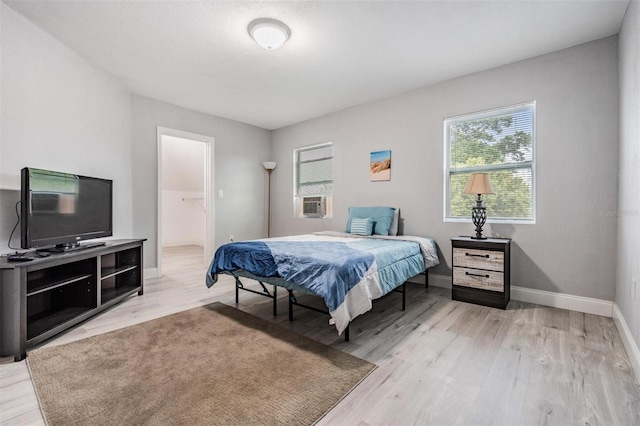 bedroom with light hardwood / wood-style flooring