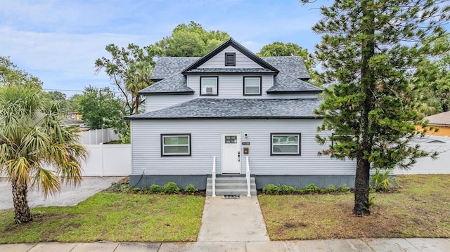 view of front of property with a front lawn