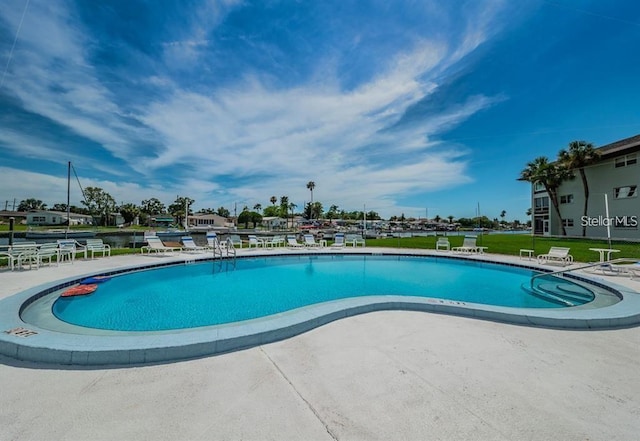 community pool featuring a patio