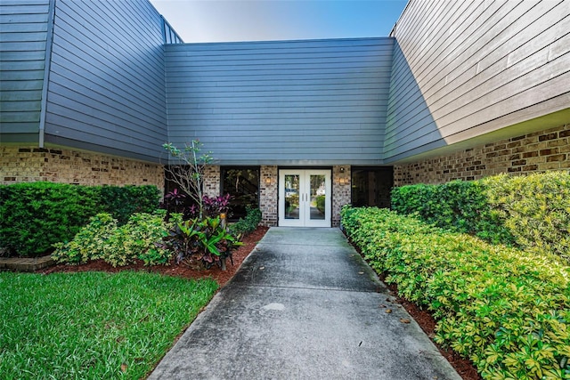 property entrance featuring french doors