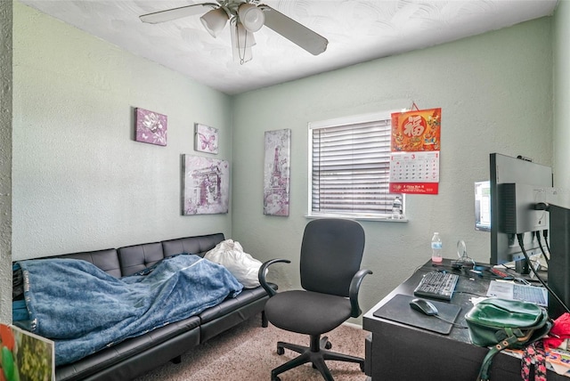 office featuring carpet and ceiling fan