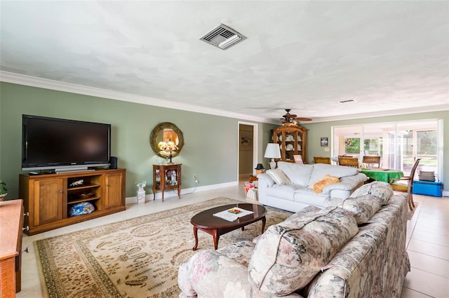 living room with crown molding, ceiling fan, and light tile floors