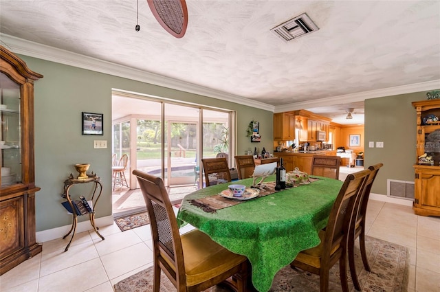 tiled dining space with ornamental molding