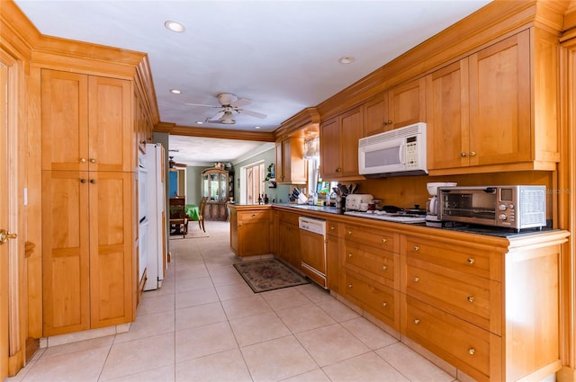 kitchen featuring ceiling fan, white appliances, and light tile floors