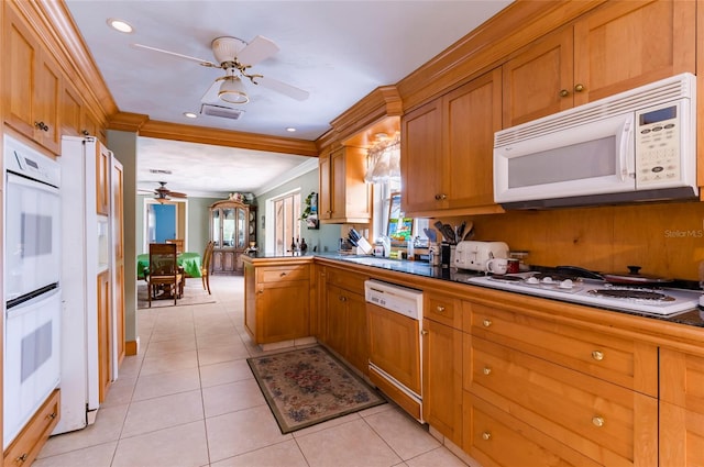 kitchen with ornamental molding, white appliances, ceiling fan, and light tile floors