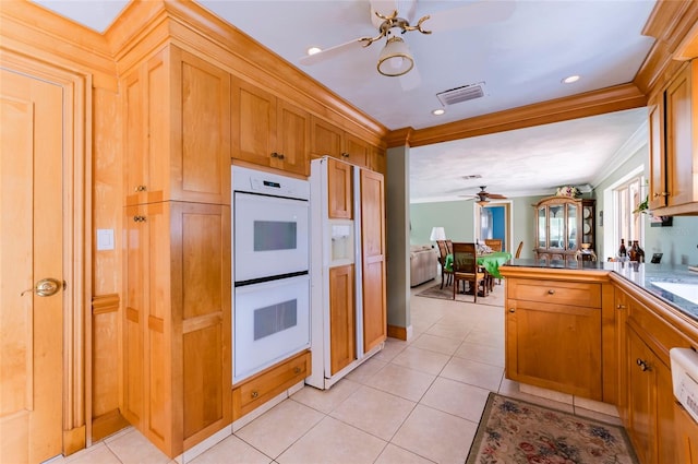 kitchen featuring ceiling fan, white appliances, ornamental molding, and light tile flooring