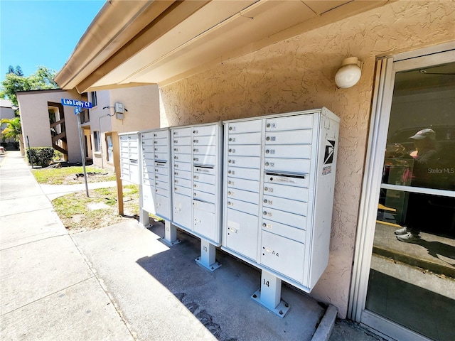 view of property's community featuring mail boxes