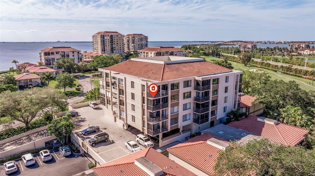 birds eye view of property featuring a water view