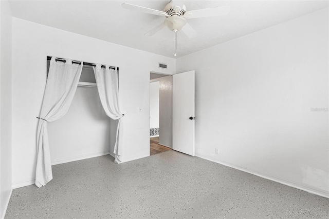 unfurnished bedroom featuring ceiling fan