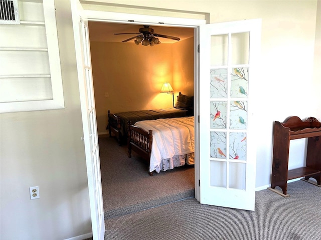 carpeted bedroom featuring ceiling fan