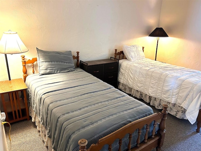 bedroom featuring light carpet