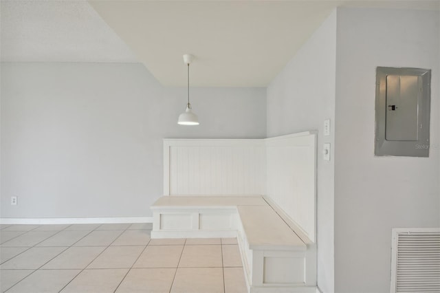 interior space featuring tile patterned floors and electric panel