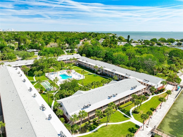 birds eye view of property featuring a water view