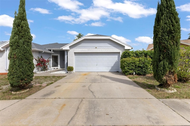 ranch-style home featuring a garage