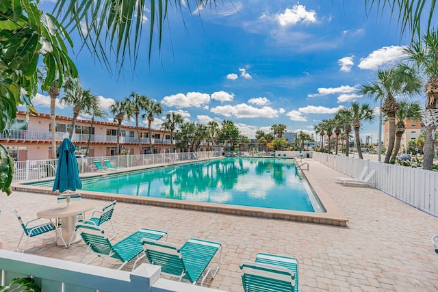 view of swimming pool featuring a patio