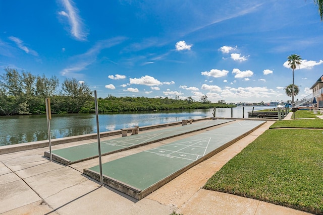 view of nearby features with a water view and a yard