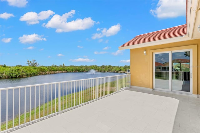 view of patio featuring a water view