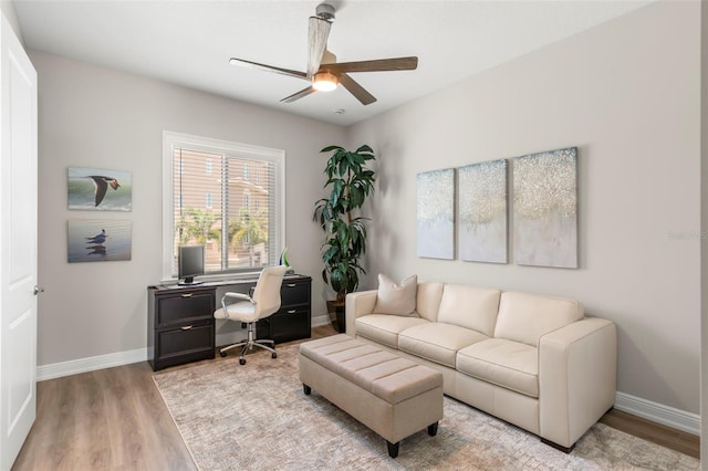 office space featuring ceiling fan and wood-type flooring