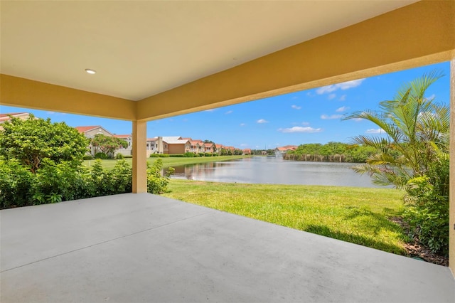 view of patio / terrace with a water view