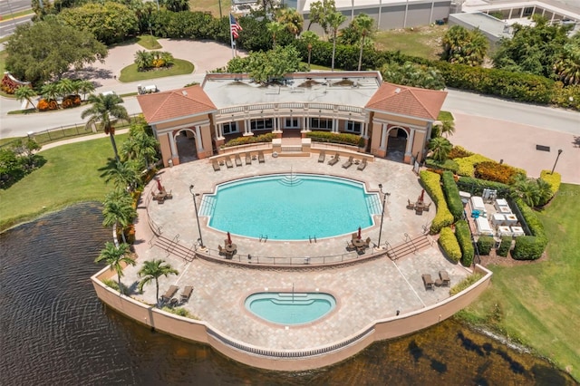 view of pool with a water view, a gazebo, and a patio area