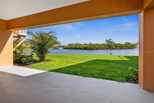 view of terrace featuring a water view