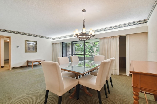 carpeted dining space with a chandelier and a textured ceiling