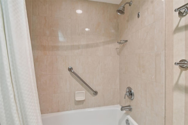 bathroom featuring shower / bath combo with shower curtain