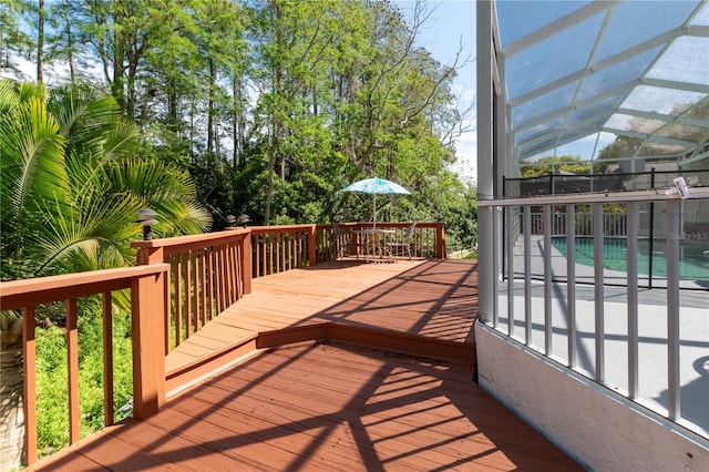 wooden terrace with glass enclosure