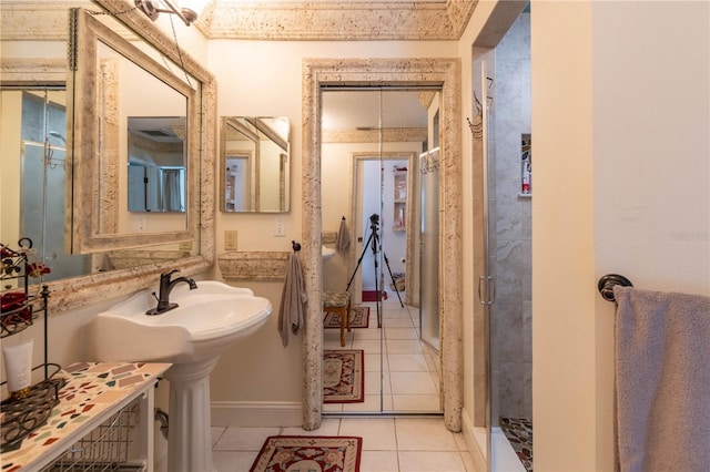 bathroom with tile patterned floors and walk in shower