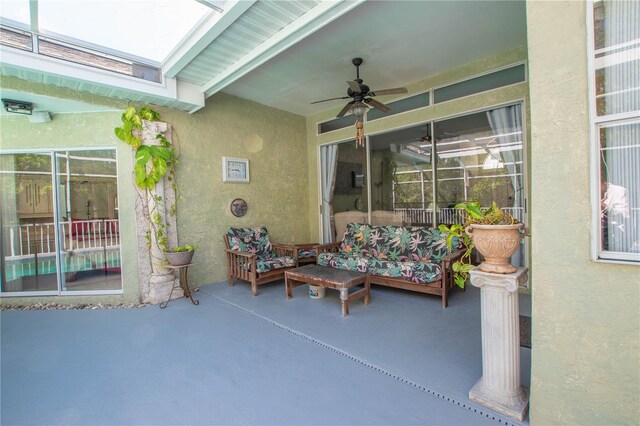 view of patio featuring ceiling fan and an outdoor hangout area