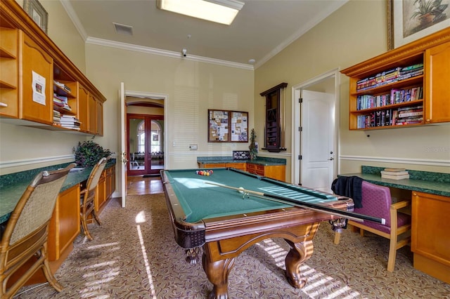 rec room with ornamental molding, built in desk, pool table, and french doors