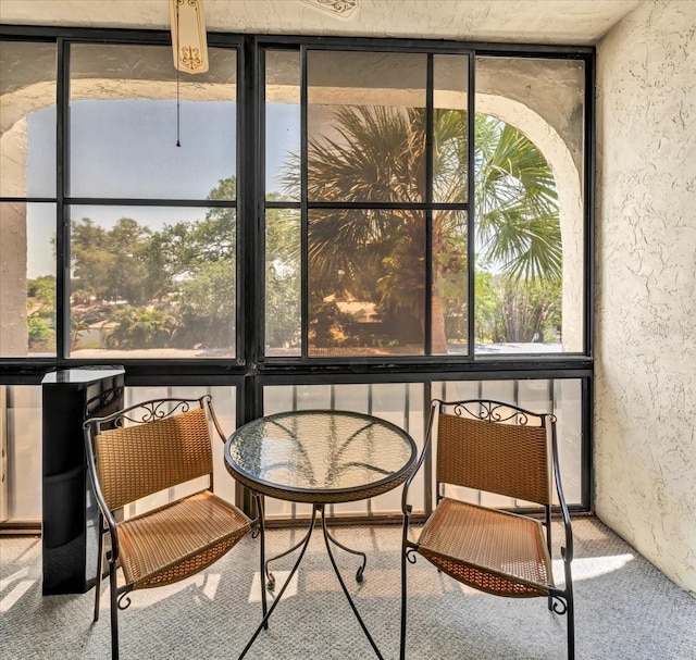 sunroom / solarium with a healthy amount of sunlight