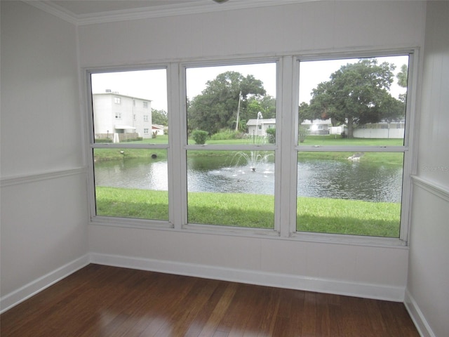 interior space featuring a healthy amount of sunlight and a water view