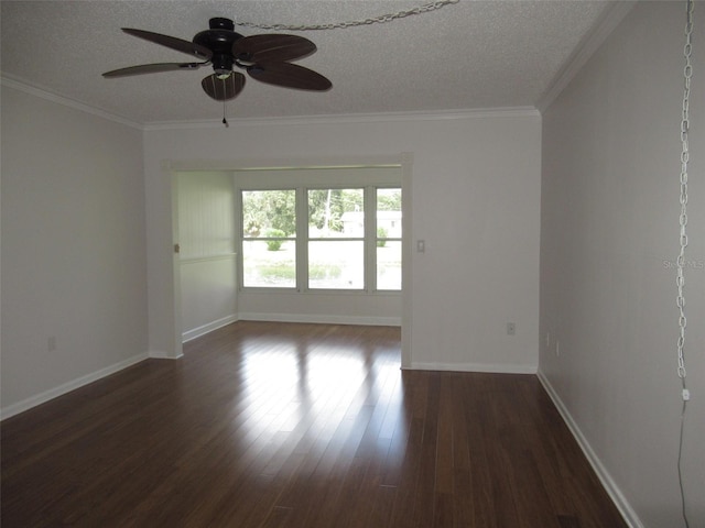 unfurnished room with baseboards, a textured ceiling, ornamental molding, and wood finished floors