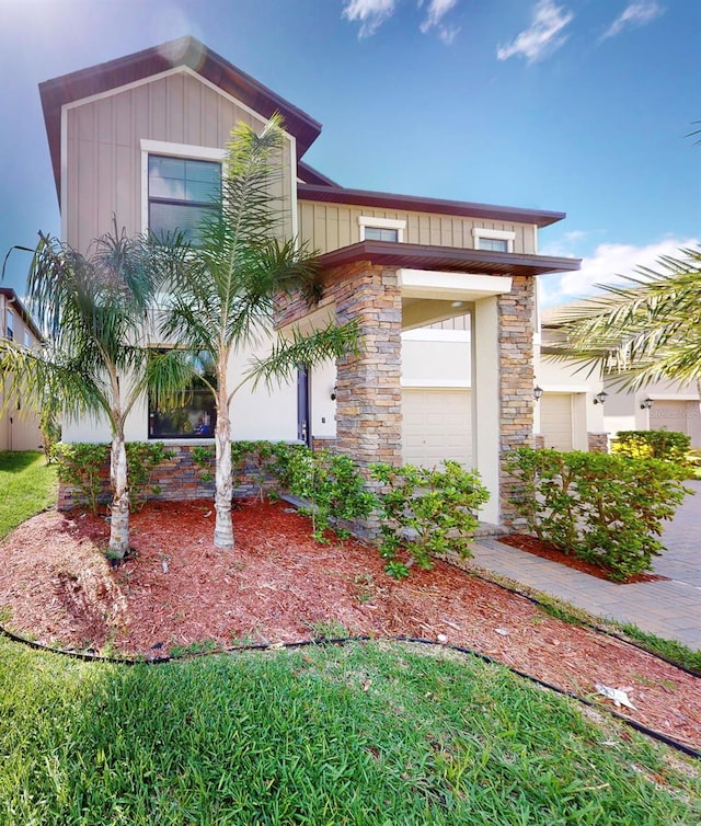 view of front of property with a garage