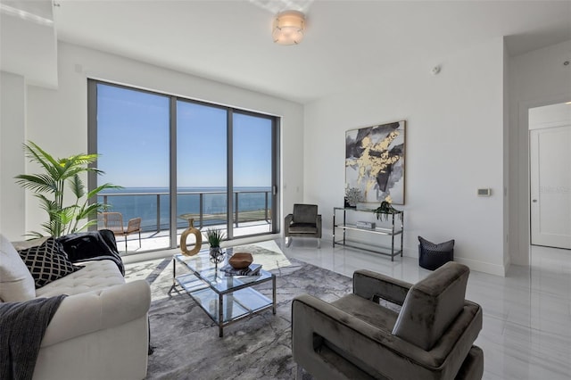 tiled living room with a water view