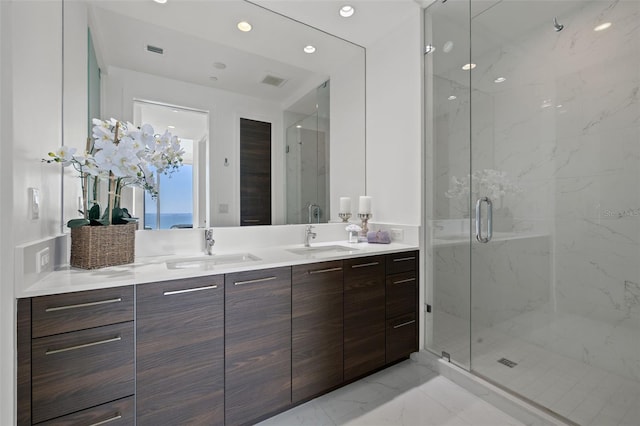 bathroom featuring walk in shower, dual bowl vanity, and tile floors