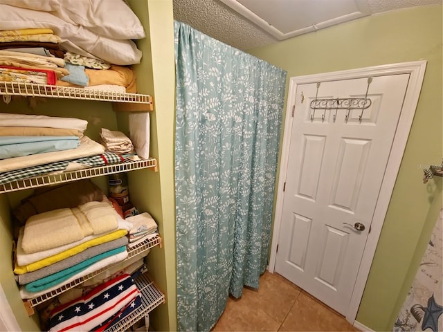 interior space featuring tile flooring