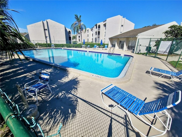 view of pool featuring a patio