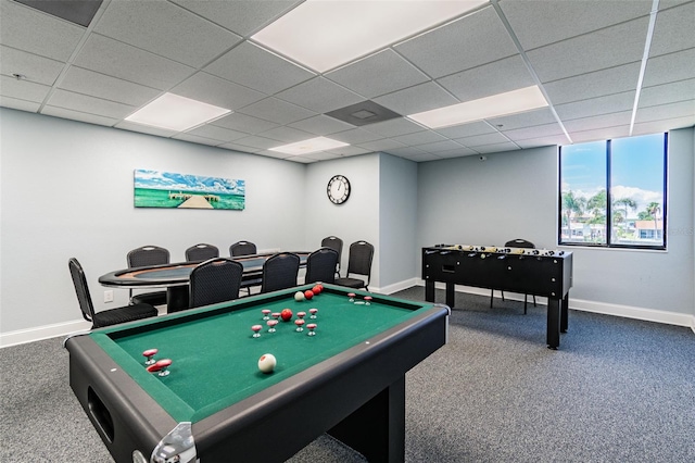 game room with a drop ceiling, pool table, and dark colored carpet