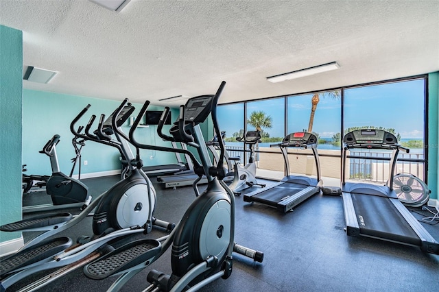 gym with a textured ceiling