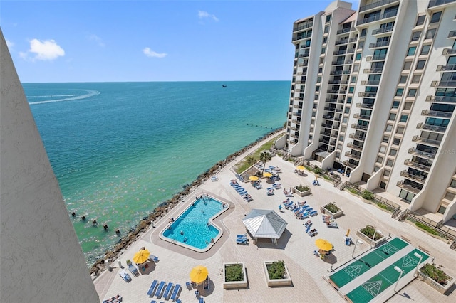 birds eye view of property with a water view