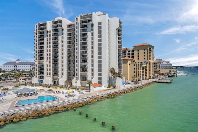 view of building exterior featuring a water view