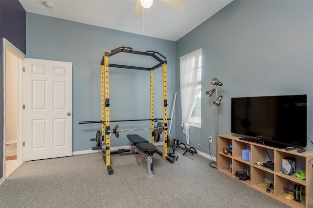 workout room with ceiling fan and carpet flooring