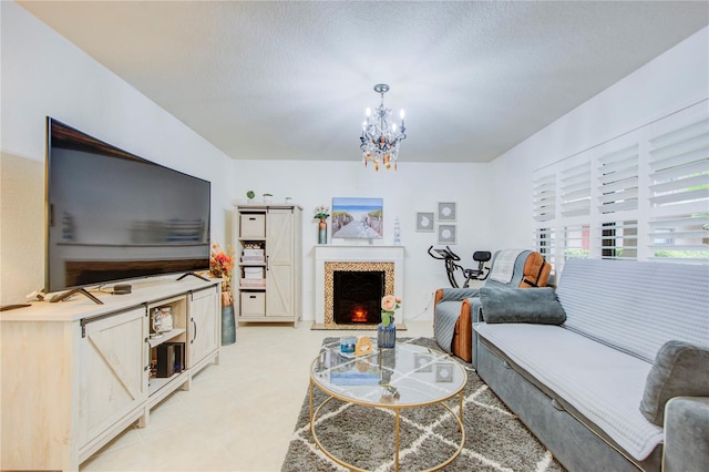 living room with an inviting chandelier and light tile floors