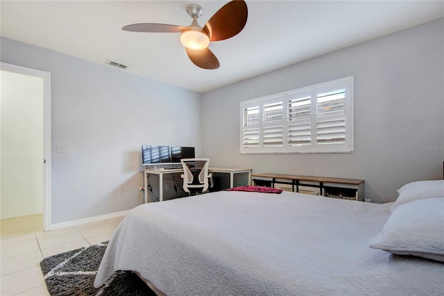 tiled bedroom with ceiling fan