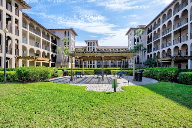 view of nearby features featuring a yard and a pergola