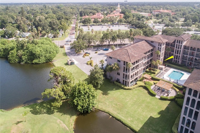 birds eye view of property with a water view