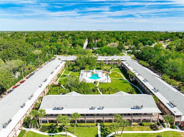 aerial view featuring a view of trees