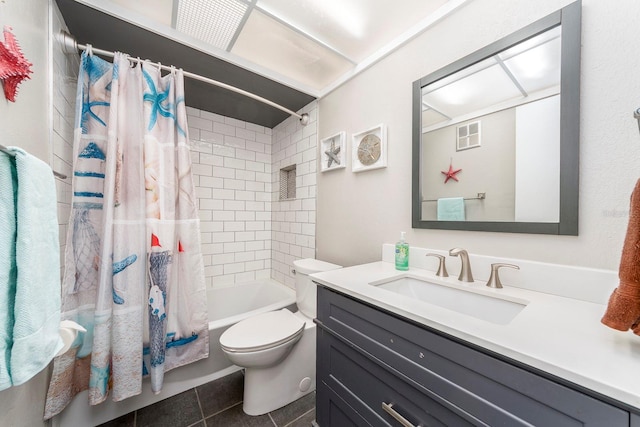 full bathroom with vanity, tile patterned floors, toilet, and shower / bath combo